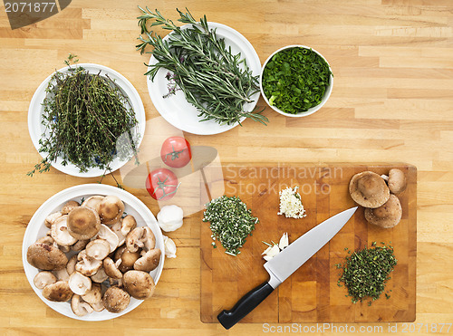 Image of Vegetables And Chopping Board On Kitchen Counter