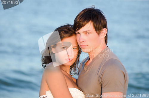 Image of beautiful young couple on the beach