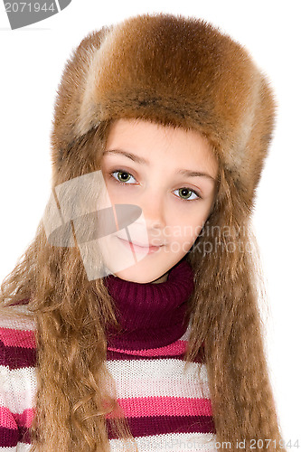 Image of The girl in a winter fur-cap