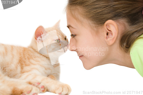 Image of The girl with a red kitten