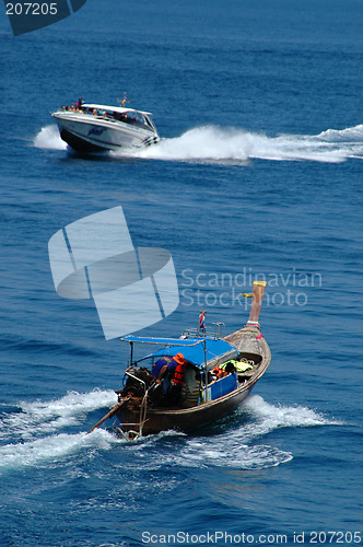 Image of Tailboat and speedboat