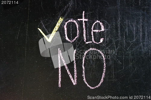 Image of Vote written on blackboard 