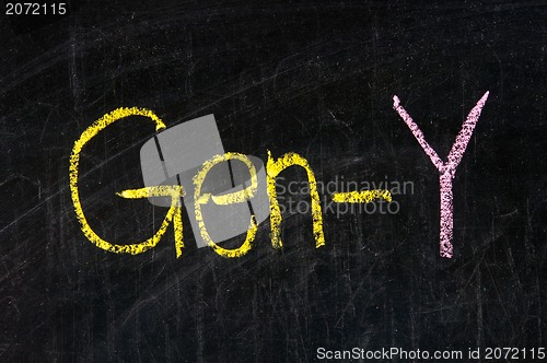 Image of  The word GEN-Y handwritten with chalk  on a blackboard