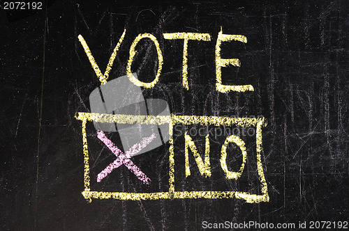 Image of Vote written on blackboard 