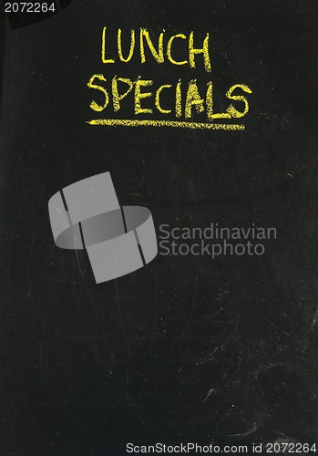 Image of  lunch specials on blackboard in vertical