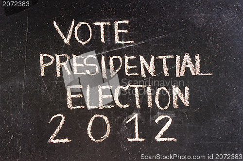 Image of Vote written on blackboard 