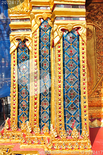 Image of The gold stucco design of native thai style on the Wall 