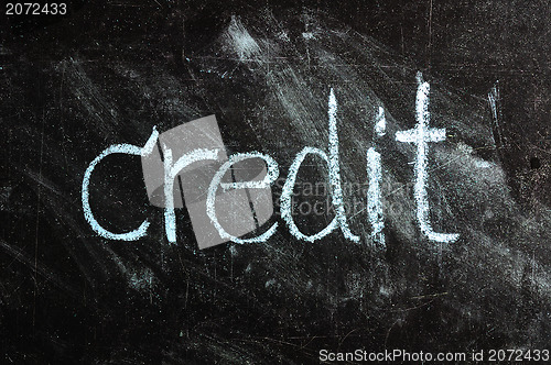 Image of business CREDIT written on blackboard 