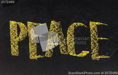 Image of Peace - word written on a blackboard 