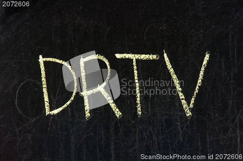 Image of The word DRTV handwritten with chalk  on a blackboard 