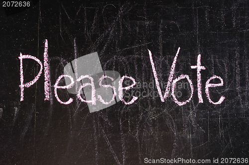 Image of Vote written on blackboard 