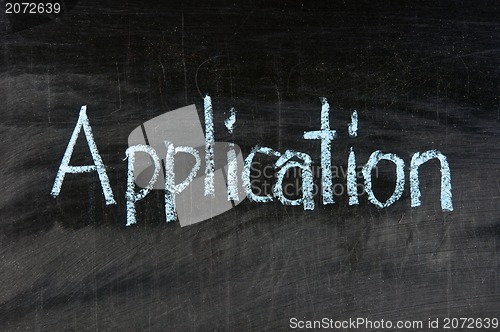 Image of The word Application handwritten with chalk  on a blackboard 