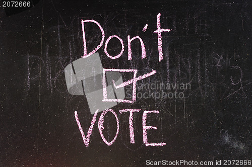 Image of Vote written on blackboard 