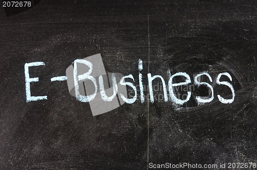 Image of E-Business handwritten with white chalk on a blackboard