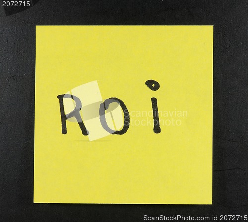 Image of ROI handwritten with postit on a blackboard