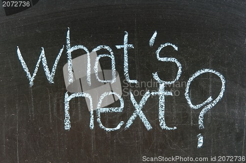 Image of Chalk writing - What's next words written on chalkboard 