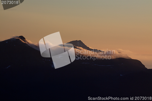 Image of Cloudy mountain peaks
