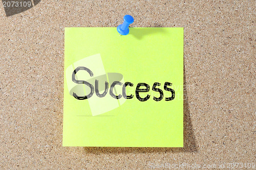 Image of The word Success handwritten with on a board 