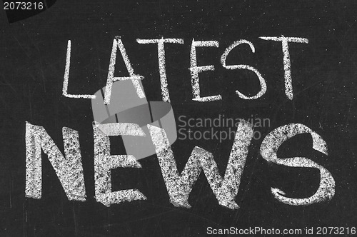 Image of Chalk drawing of Latest news  on a chalkboard 