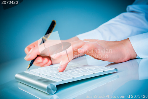 Image of Female hands and keyboard