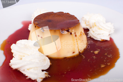Image of Flan in fruity sauce
