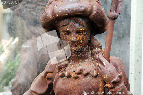 Image of Garden figurines at the flea market. Paris, France.