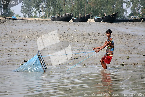 Image of Fishing in a Ganges river