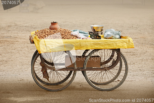 Image of Counter to sell roasted peanuts. India.