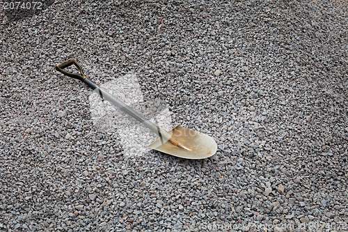Image of Shovel on the gravel - road works