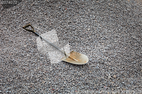 Image of Shovel on the gravel - road works