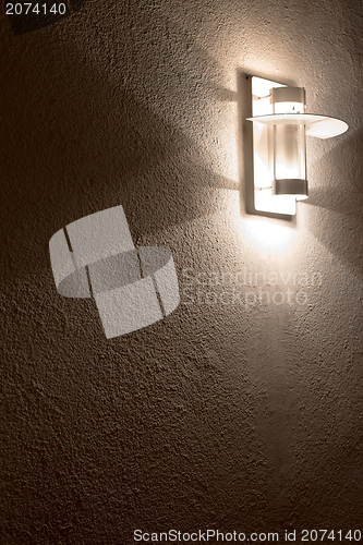 Image of Modern lamp on concrete wall