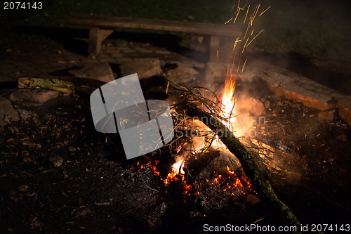 Image of Flames of a cozy campfire