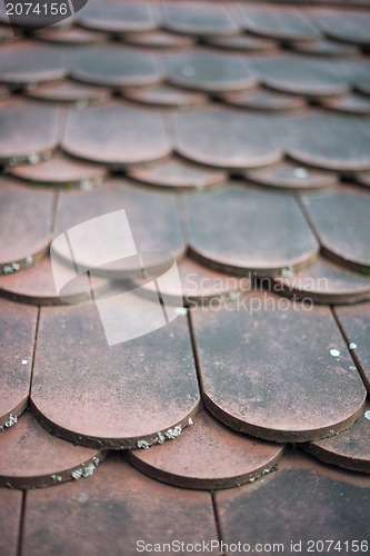 Image of old house red roof tiles