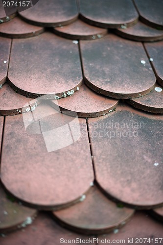 Image of old house red roof tiles