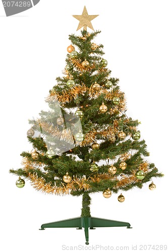 Image of Decorated christmas tree with yellow and green balls 