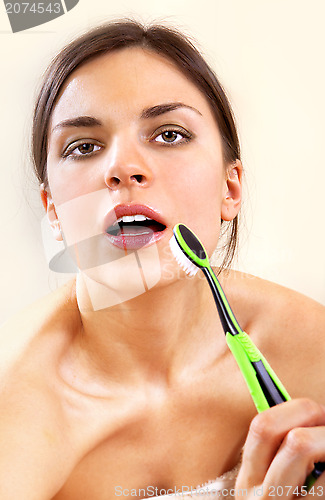 Image of woman with tooth-brush