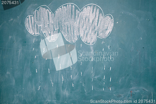 Image of Drawing of rain falling from cloud on chalkboard