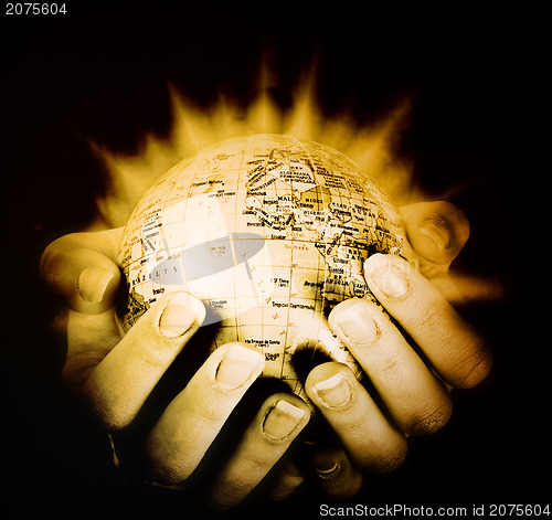 Image of Globe in a girl's hands