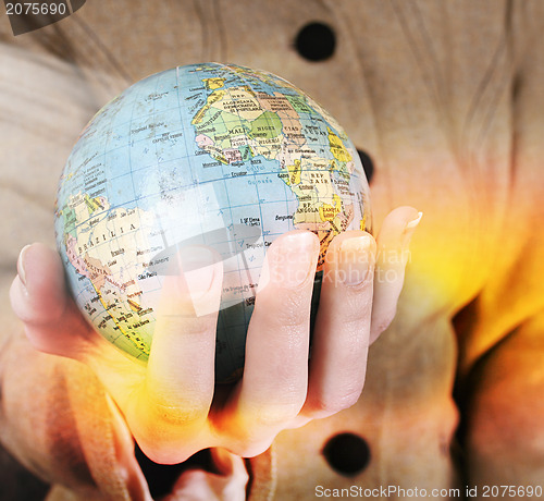 Image of Globe in a girl's hands