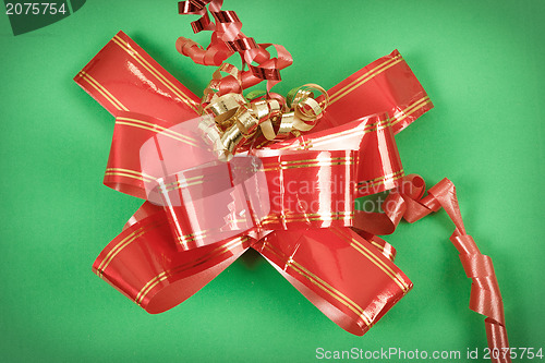 Image of red ribbon on gift