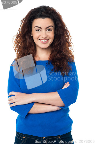 Image of Cheerful woman in trendy blue top and jeans