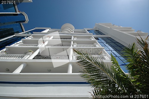 Image of Hotel and palms