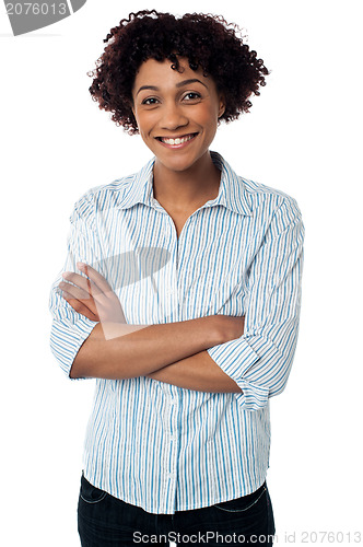 Image of Causual smiling woman with folded arms