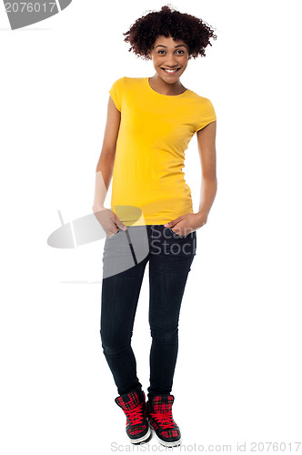 Image of Fashionable young female in trendy casuals