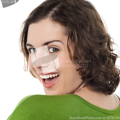 Image of Excited caucasian woman looking at you