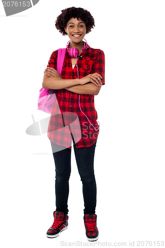 Image of Stylish university student with folded arms