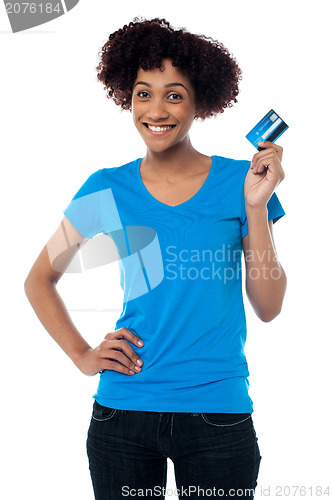 Image of Beautiful female mode hlolding up cash card