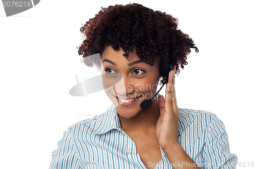 Image of Casual shot of a call centre executive looking away