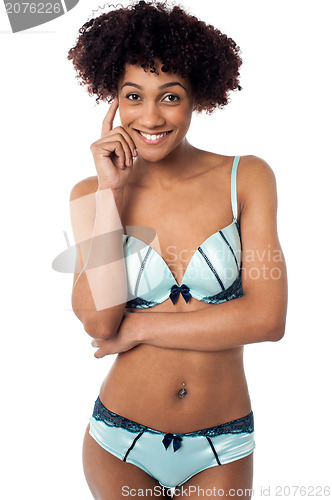 Image of Sensuous young woman in bikini