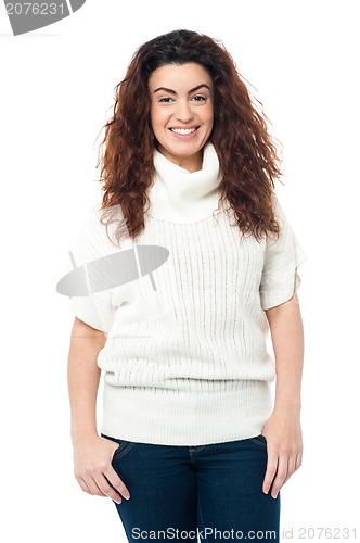 Image of Portrait of charming girl in high neck sweater